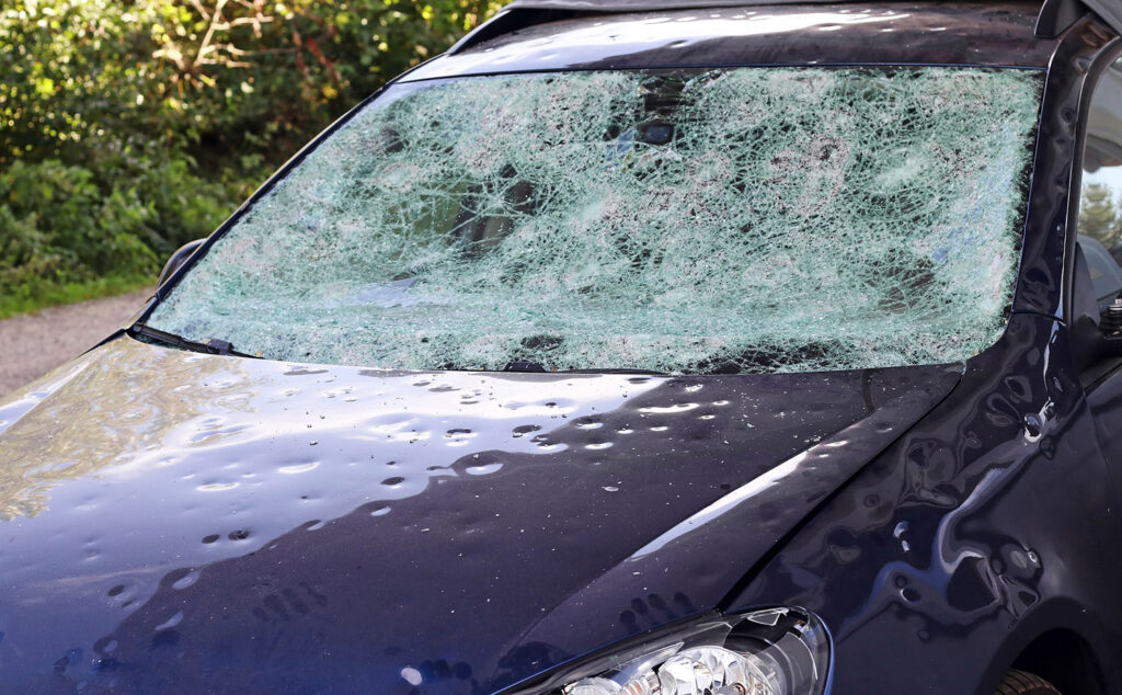 Car in need of hail damage repair in Abilene, TX